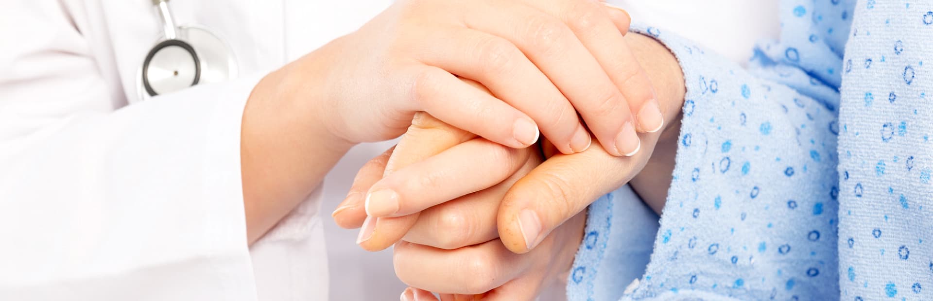 elder and caregiver hand in hand